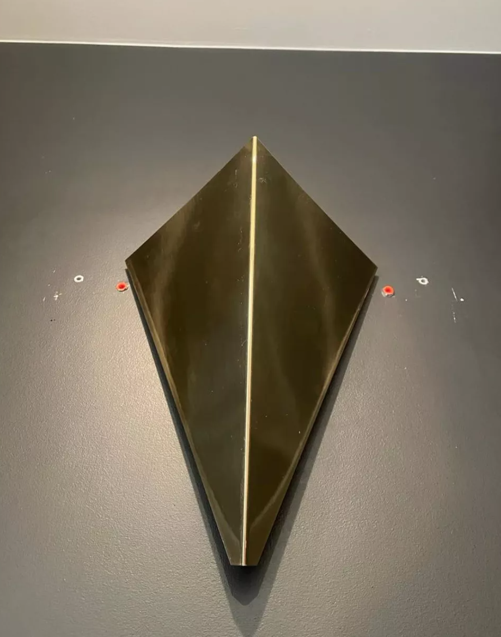 Pair of geometric vintage wall lamps in solid brass, France 1970.