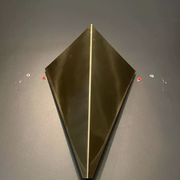 Pair of geometric vintage wall lamps in solid brass, France 1970.