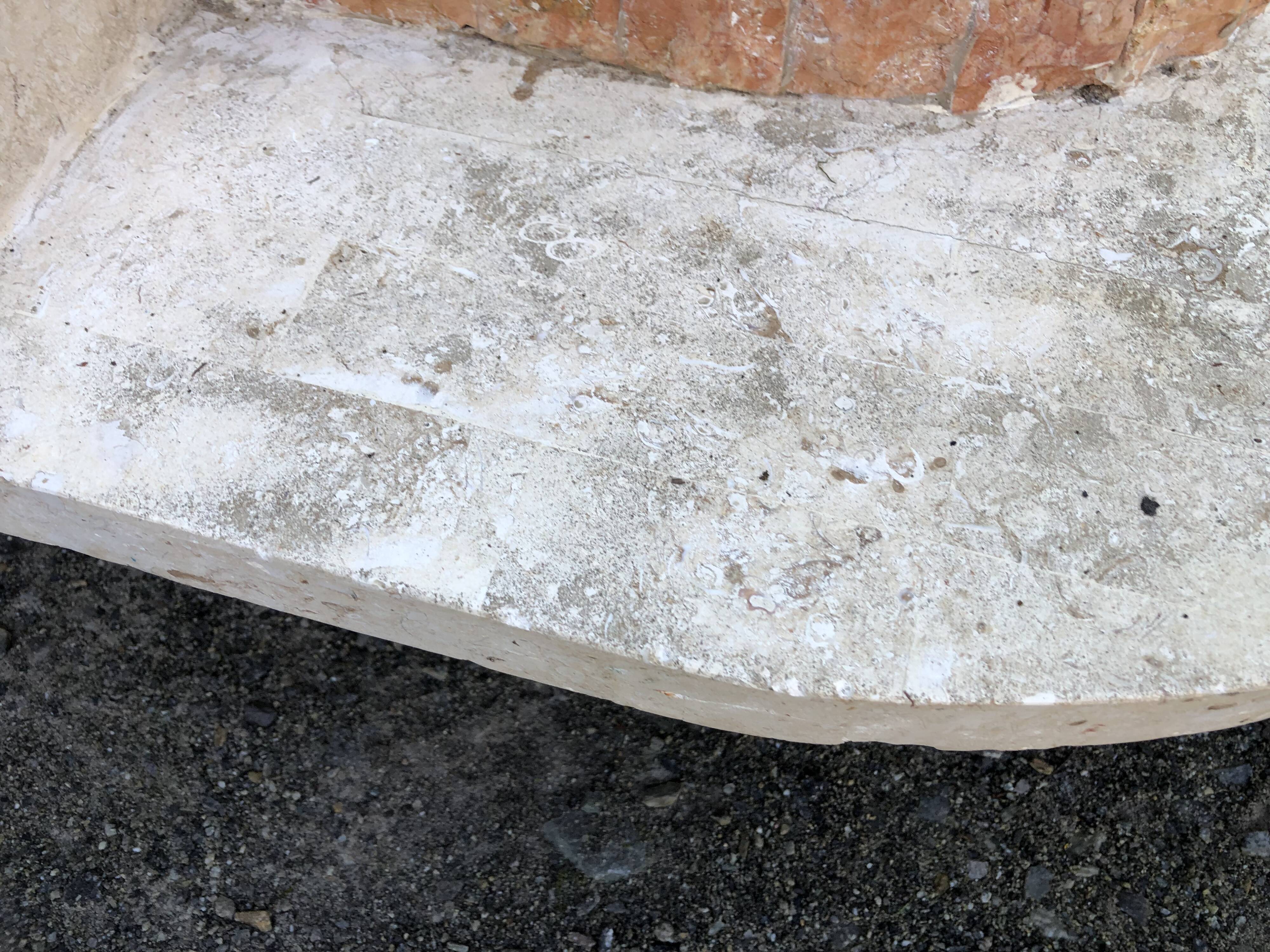 Vintage asymmetrical design coffee table in Mactan travertine stones by Magnussen ponte.