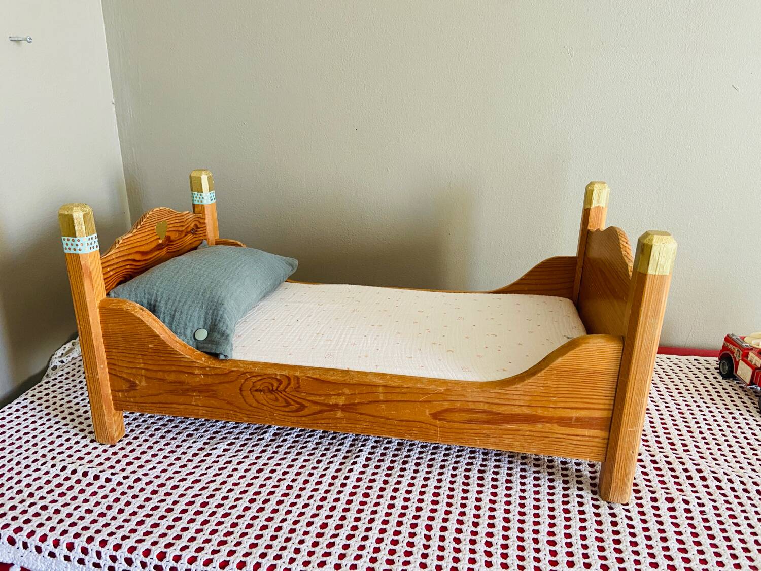 Wooden doll bed