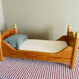 Wooden doll bed
