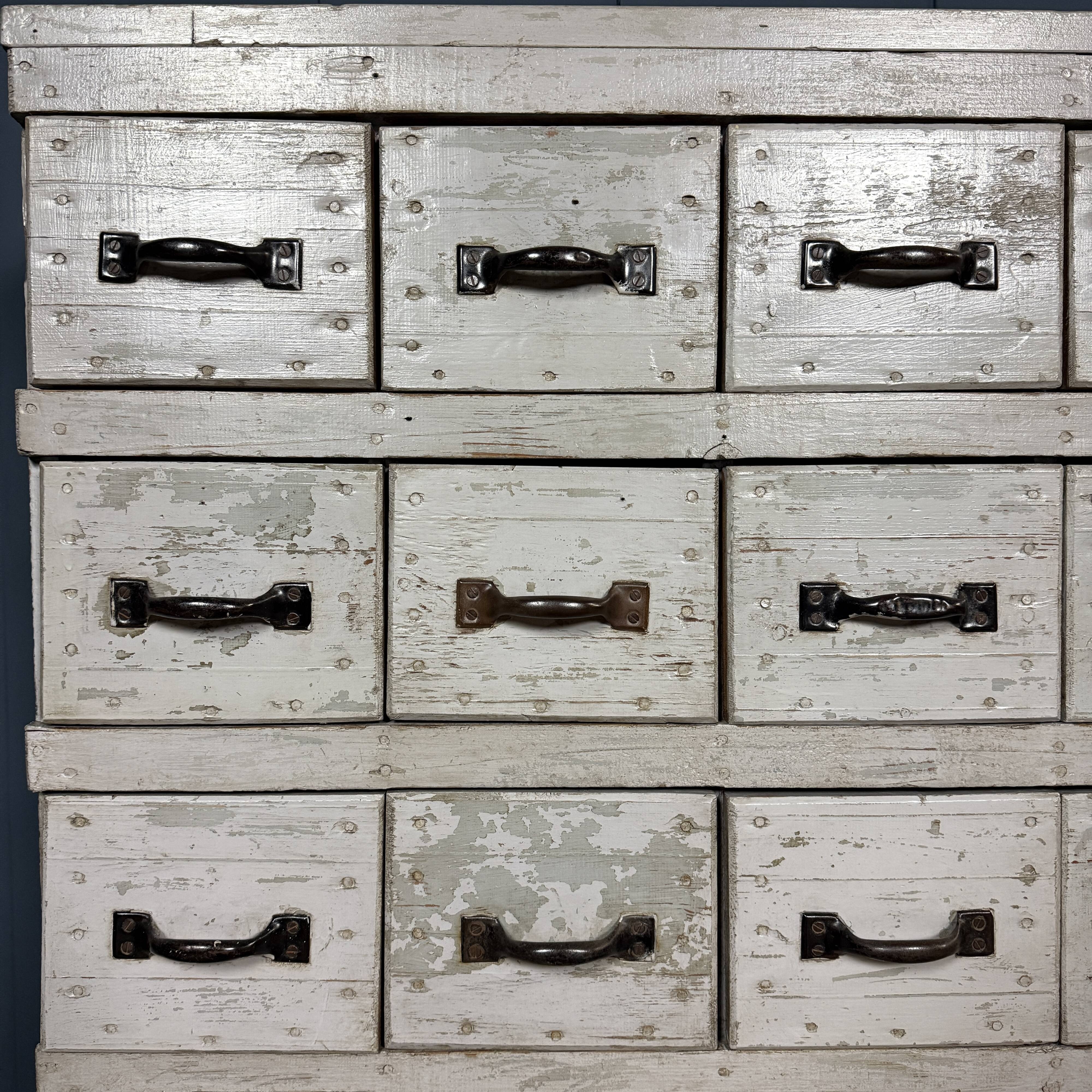 Old light grey workshop drawer cabinet with 25 drawers