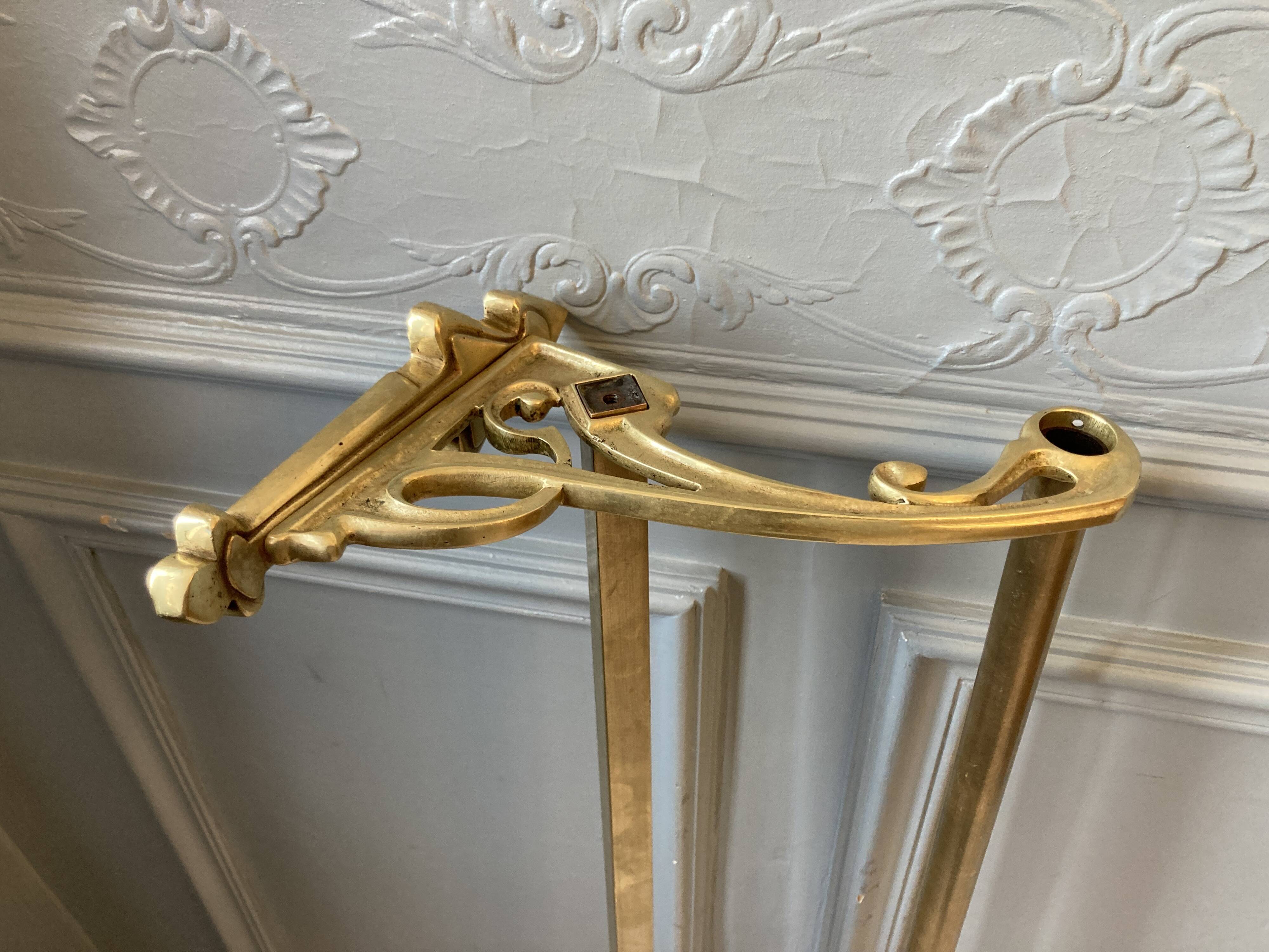 Art-deco wall-mounted coat rack in brass