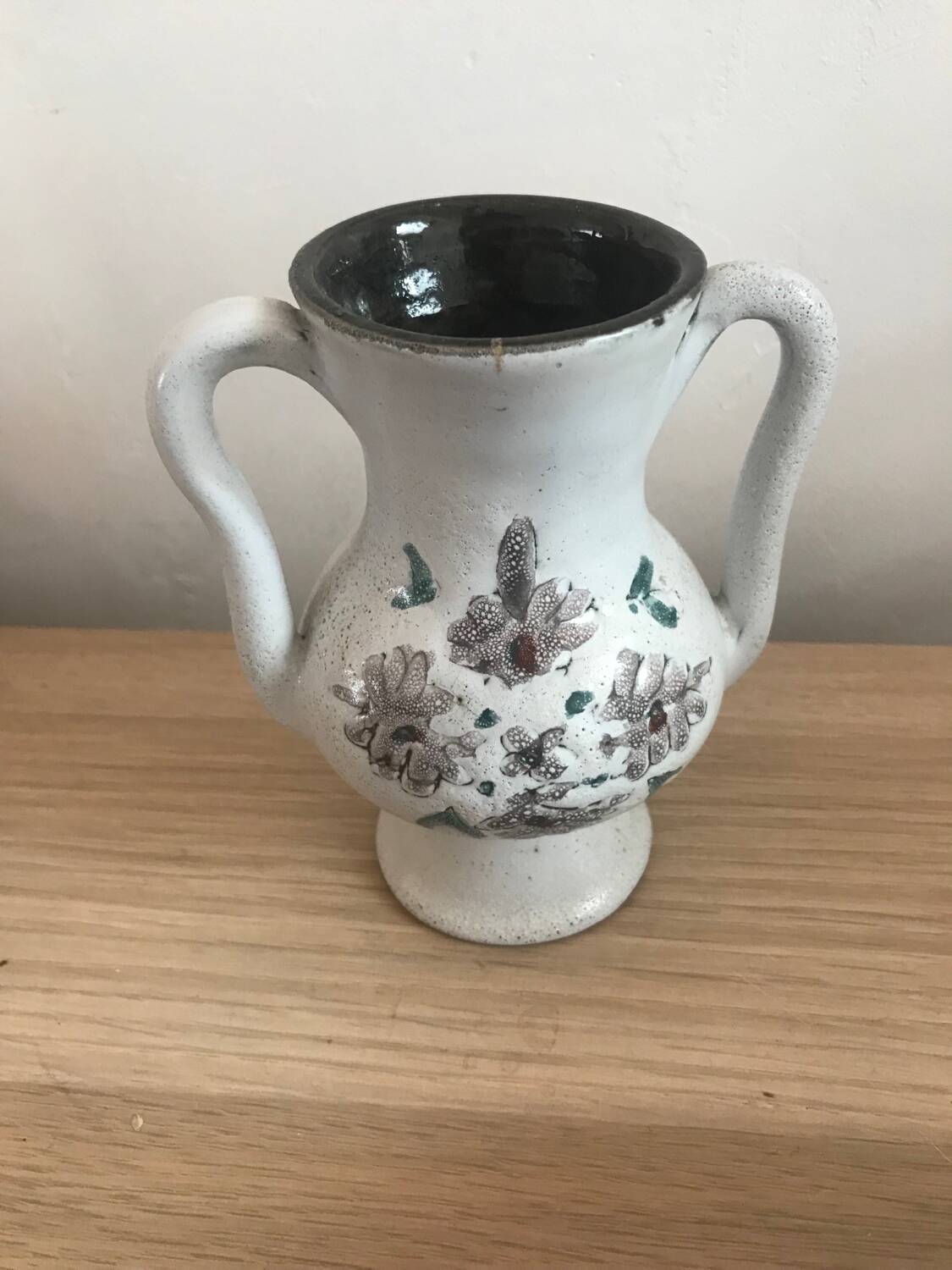 Small stoneware vase with handles and floral motifs Enameled In very good condition