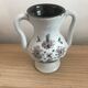 Small stoneware vase with handles and floral motifs Enameled In very good condition