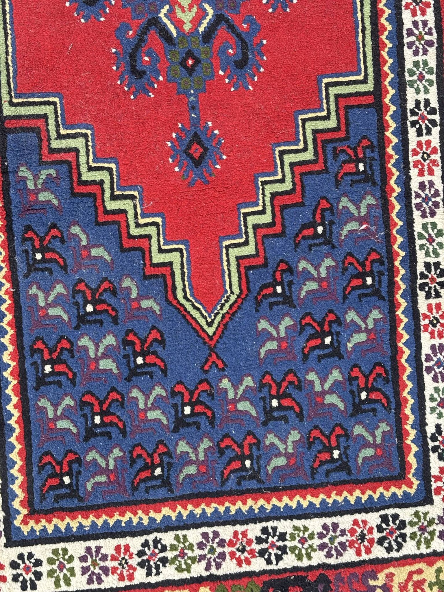 Handwoven wool oriental rug – 220 × 100 cm