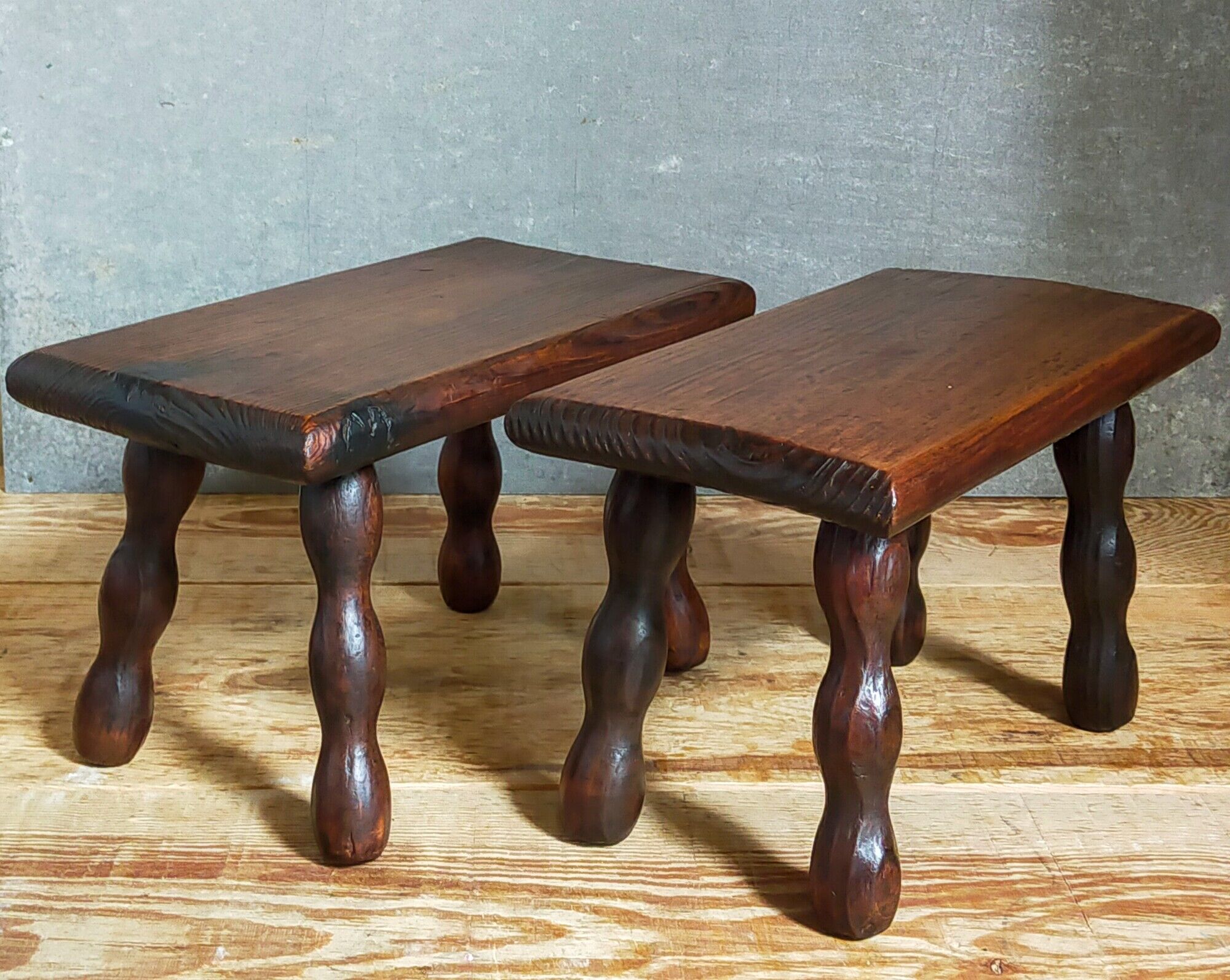 Pair of vintage solid turned wood footstools