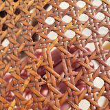 Old low caned bistro stool