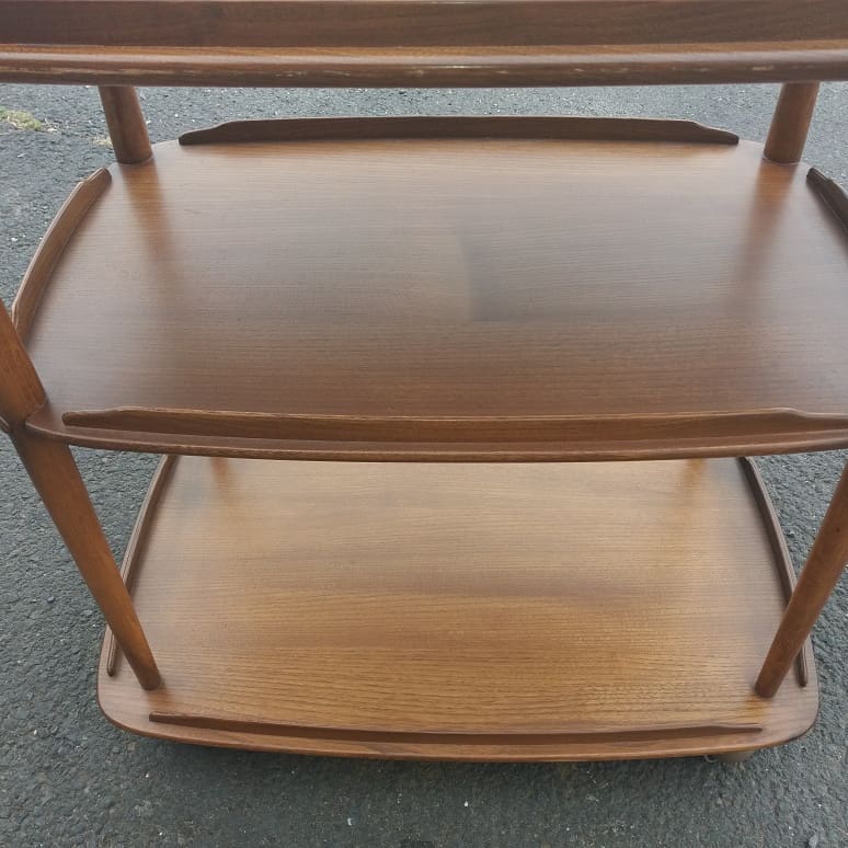 Rolling bar serving table in solid elm by Ercol, England, circa 1960