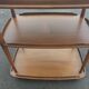 Rolling bar serving table in solid elm by Ercol, England, circa 1960