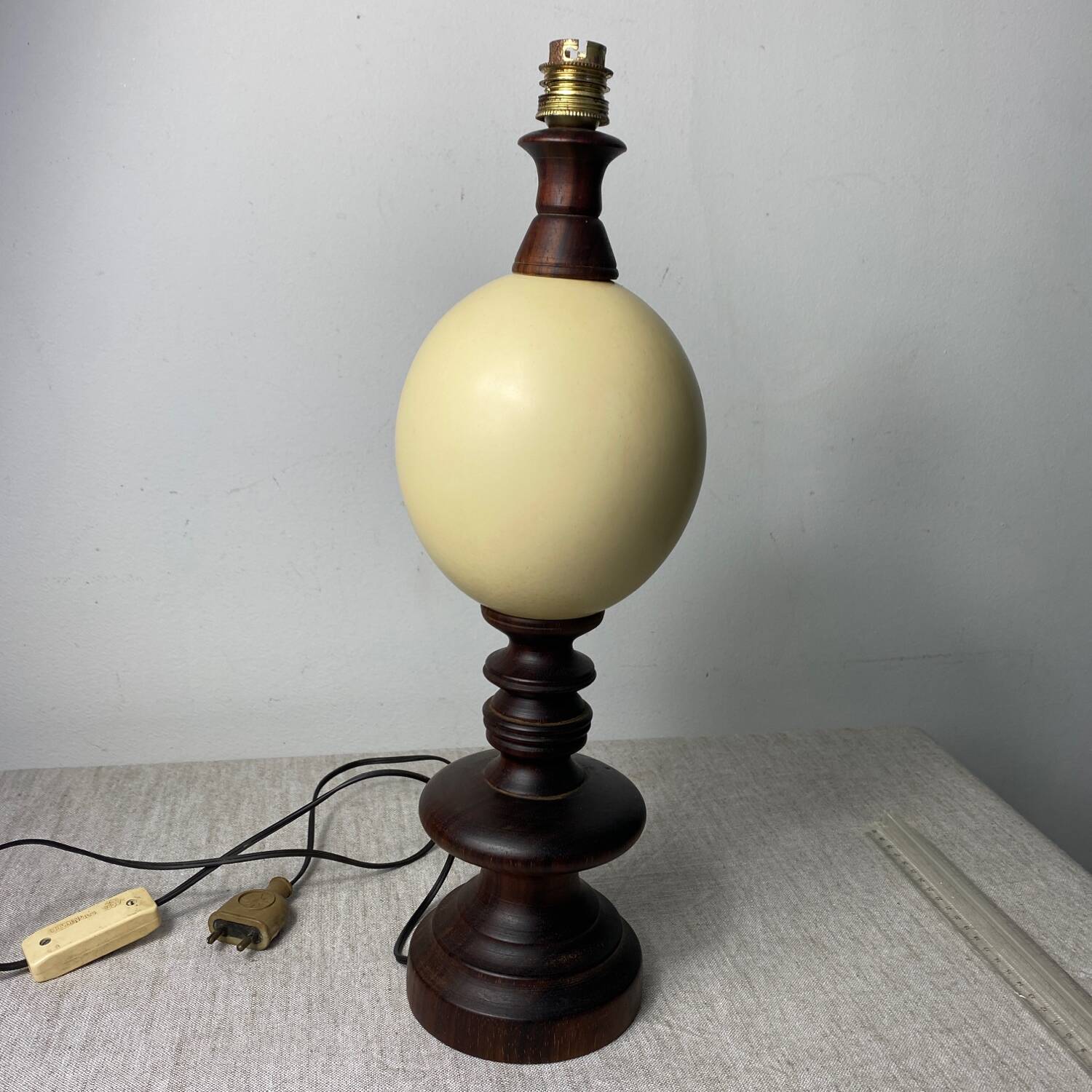 Wooden and ostrich egg lamp base