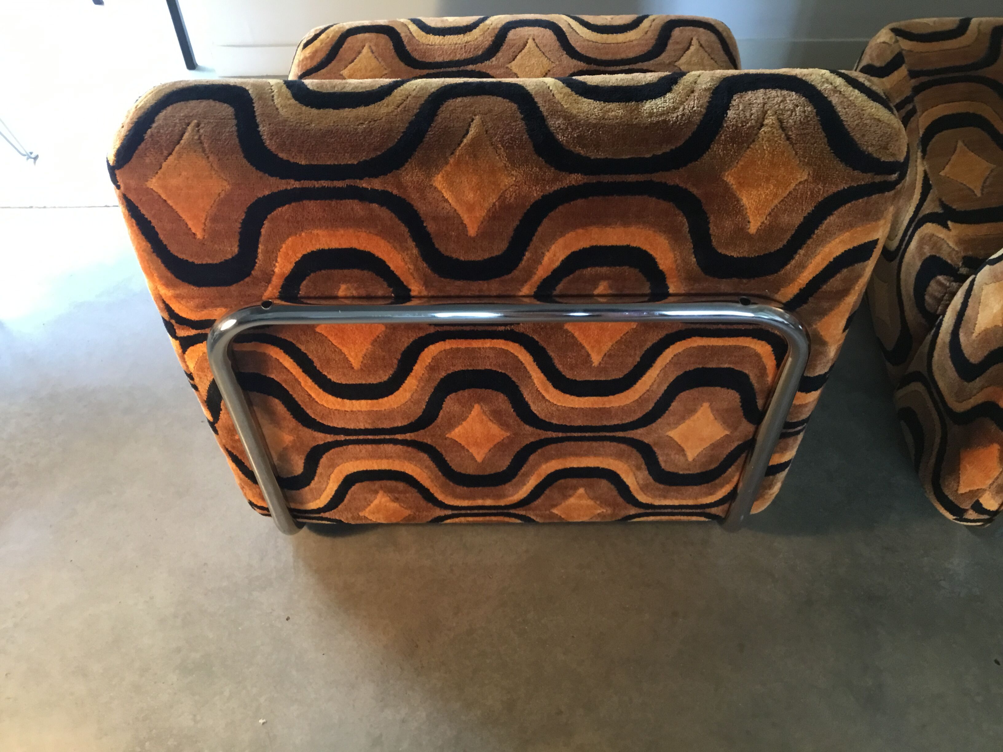 Vintage 1970s orange geometric patterned space-age armchair