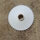 Serrated opaline suspension
