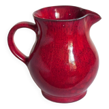 Vintage red enamel ceramic pitcher