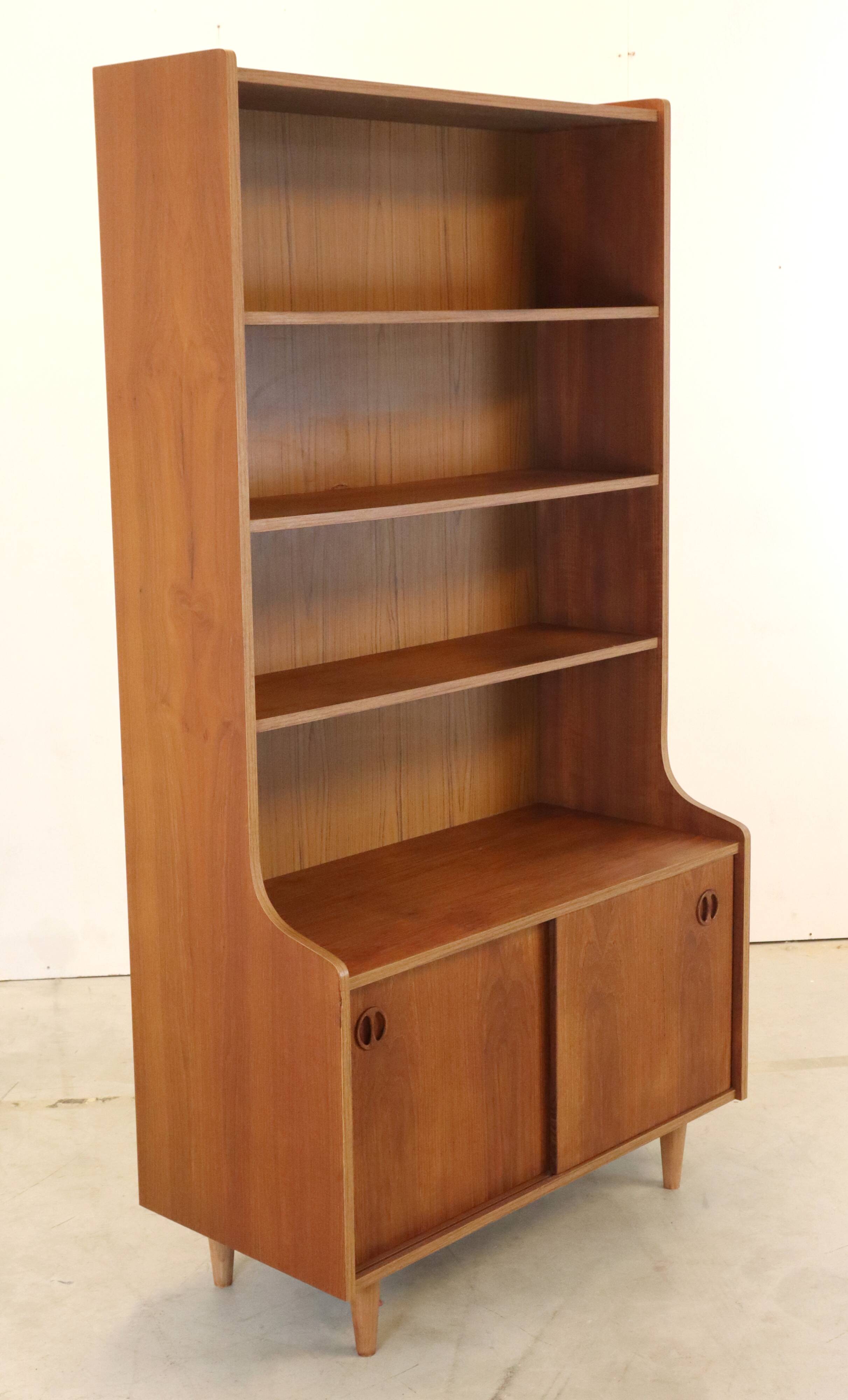 vintage bookcase with full on storage space.