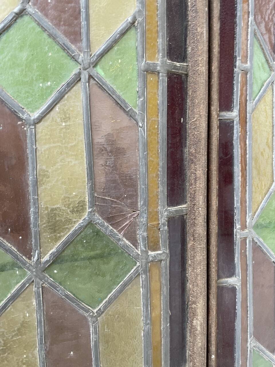 Old stained glass window in metal and glass 1900