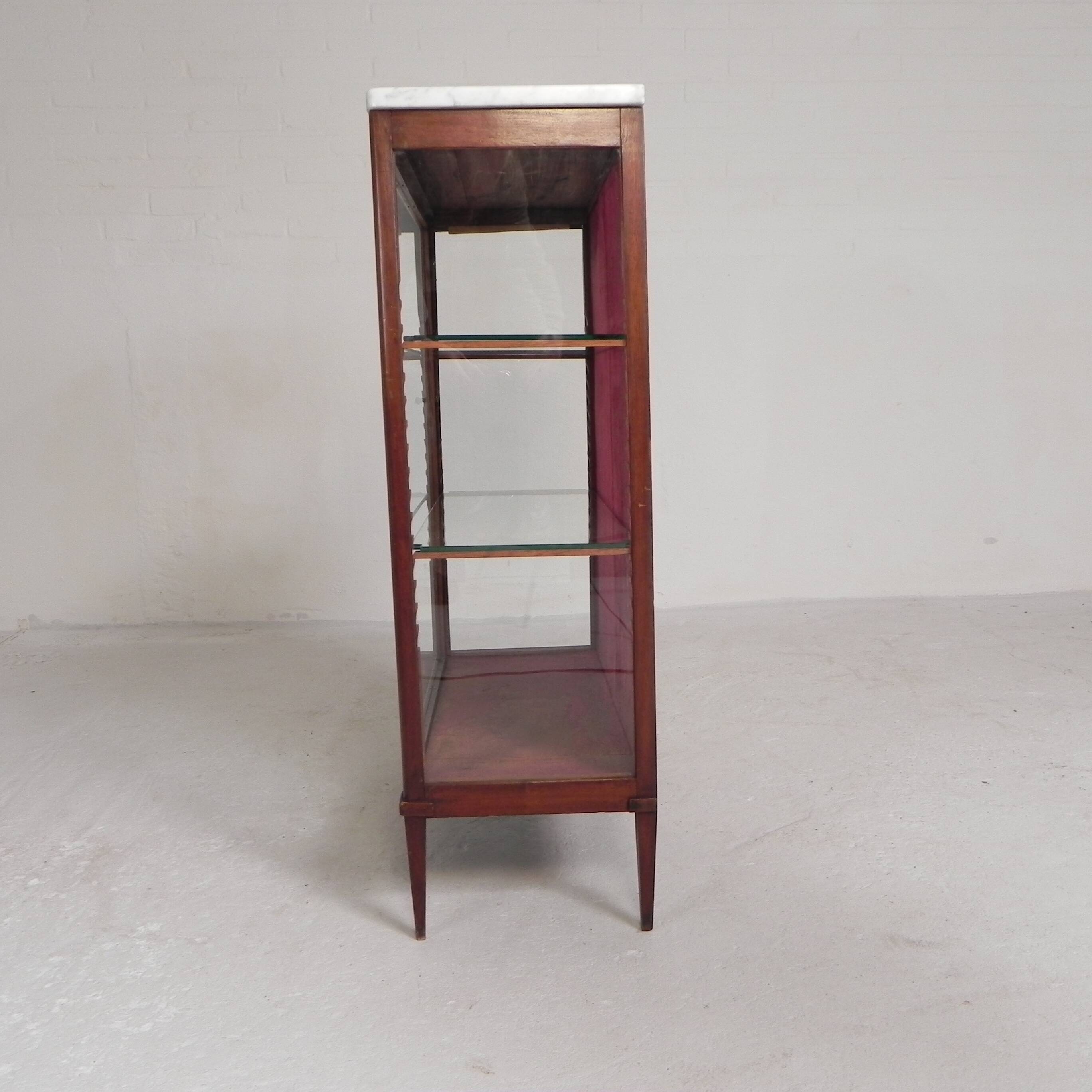 Mahogany display cabinet with marble top, 1920s