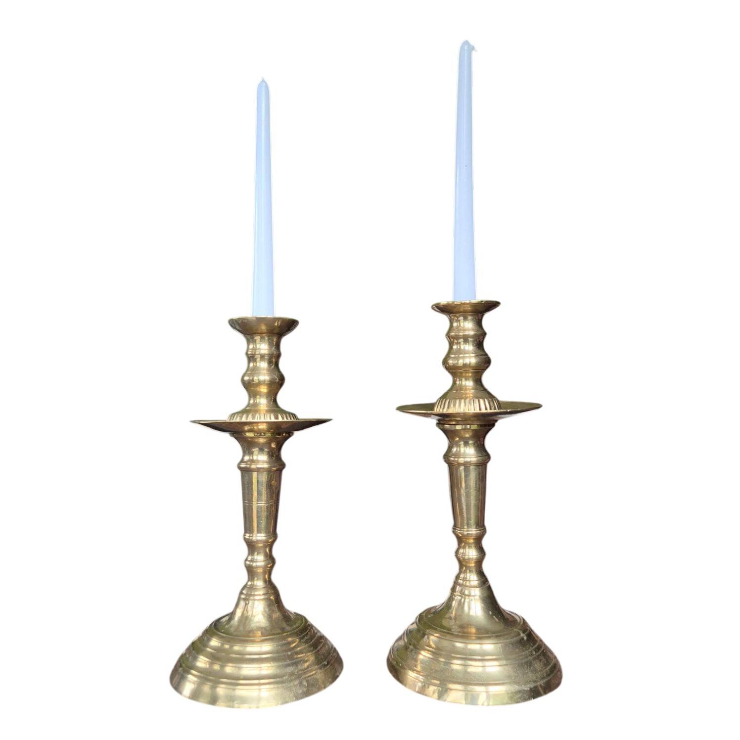 Pair of antique Moroccan brass candlesticks.