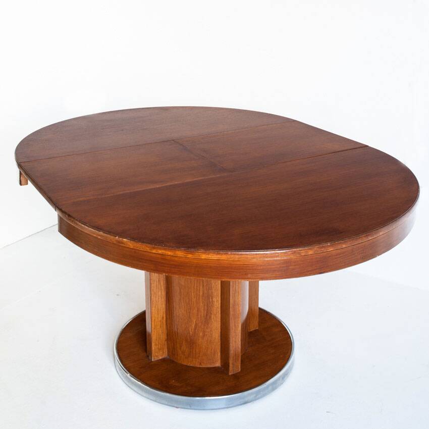 Dining table with a central extension. Vintage. Art Deco style. Varnished wood. France, 1960s.