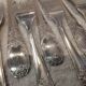 12 forks, 12 fish knives, silver-plated metal, rocaille pattern