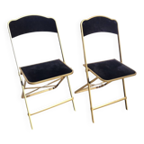 Pair of black and gold folding opera chairs
