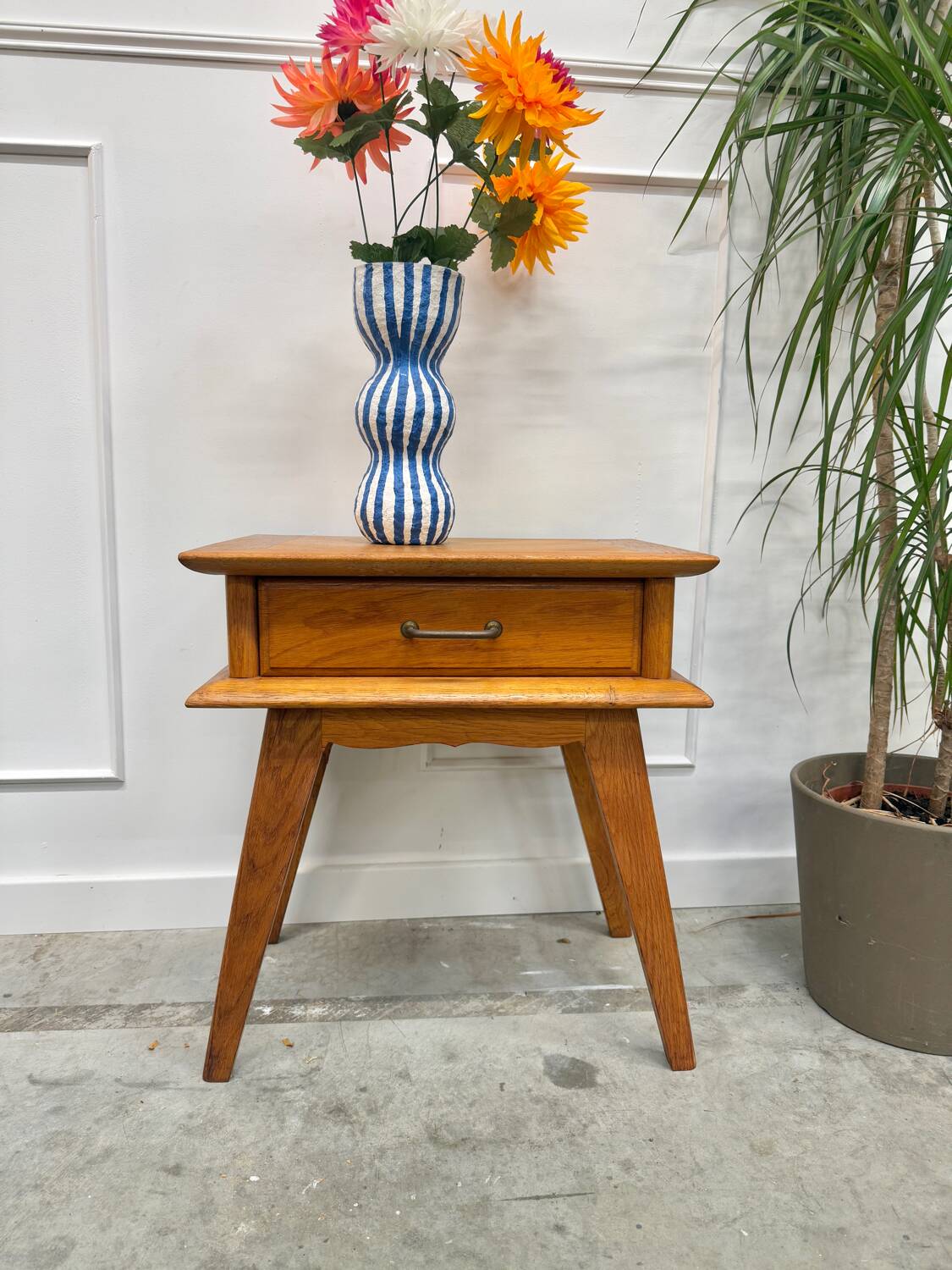 Bedside table with compass feet