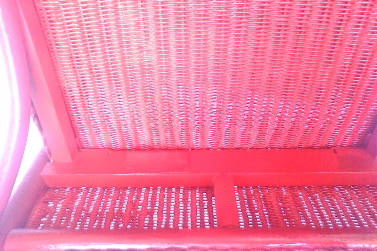 Vintage chair in red rattan