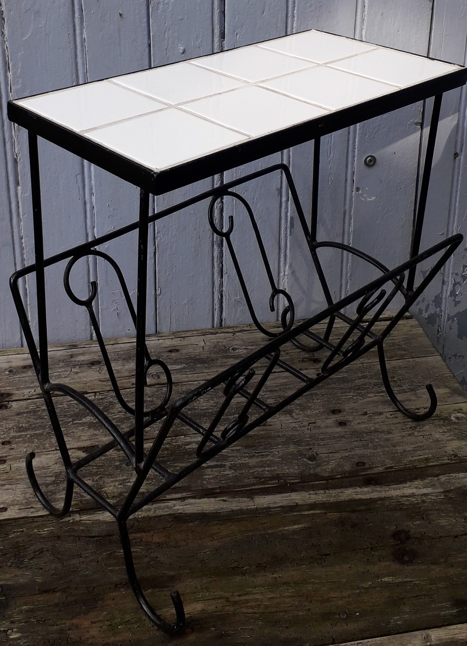 Table d'appoint porte revue en céramique