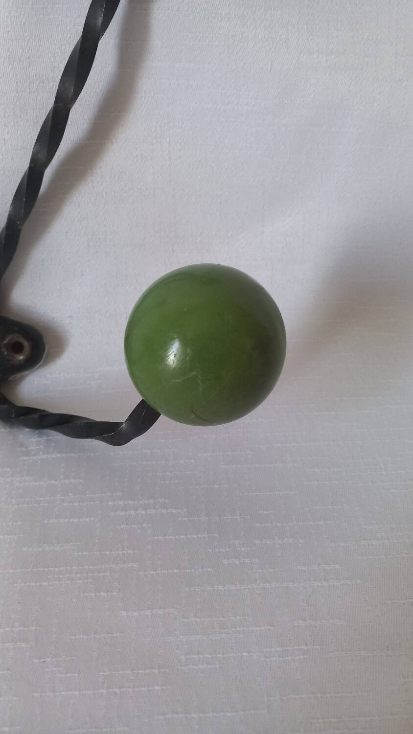 Vintage metal and wooden ball coat rack