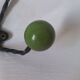 Vintage metal and wooden ball coat rack