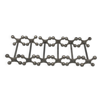 Set of 6 old table knife resistors in the shape of crossbars in silver metal