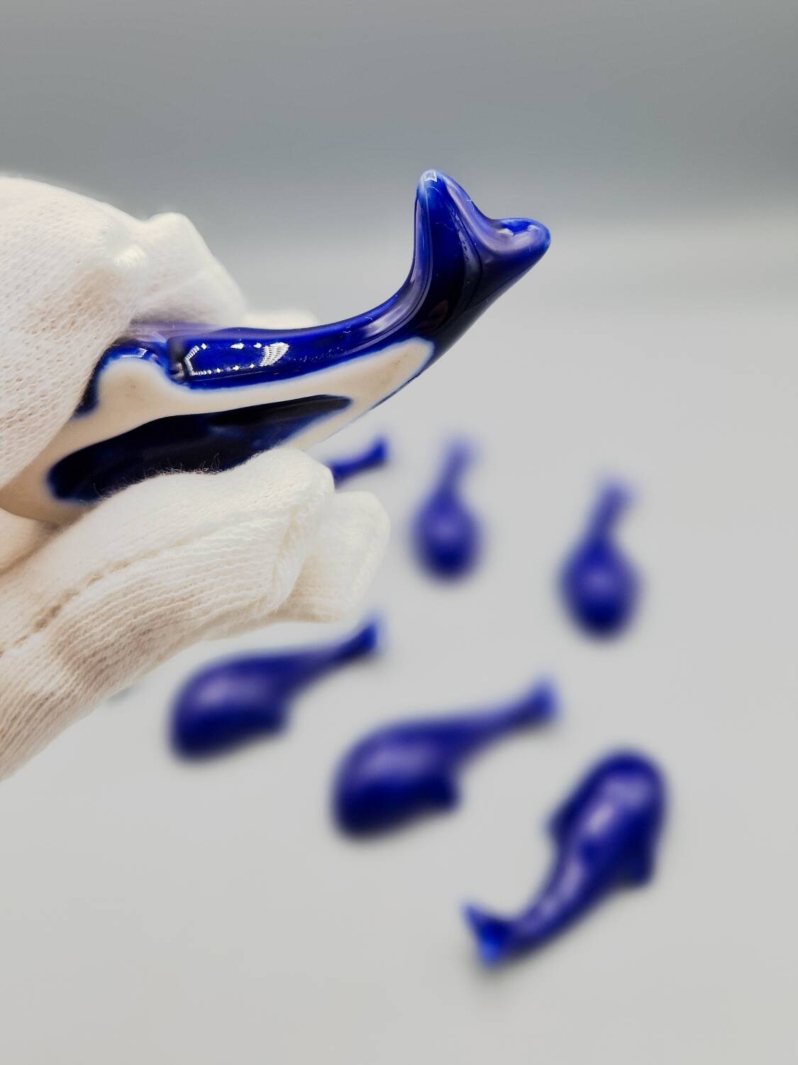 Set of 6 vintage blue porcelain whale knife rests.