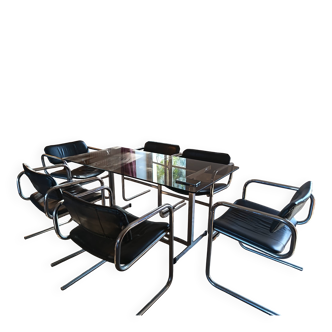 Dining table set with 6 Pieff chairs.