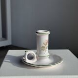 Small vintage hand-held candlestick in earthenware with green trim and floral decoration H10.5