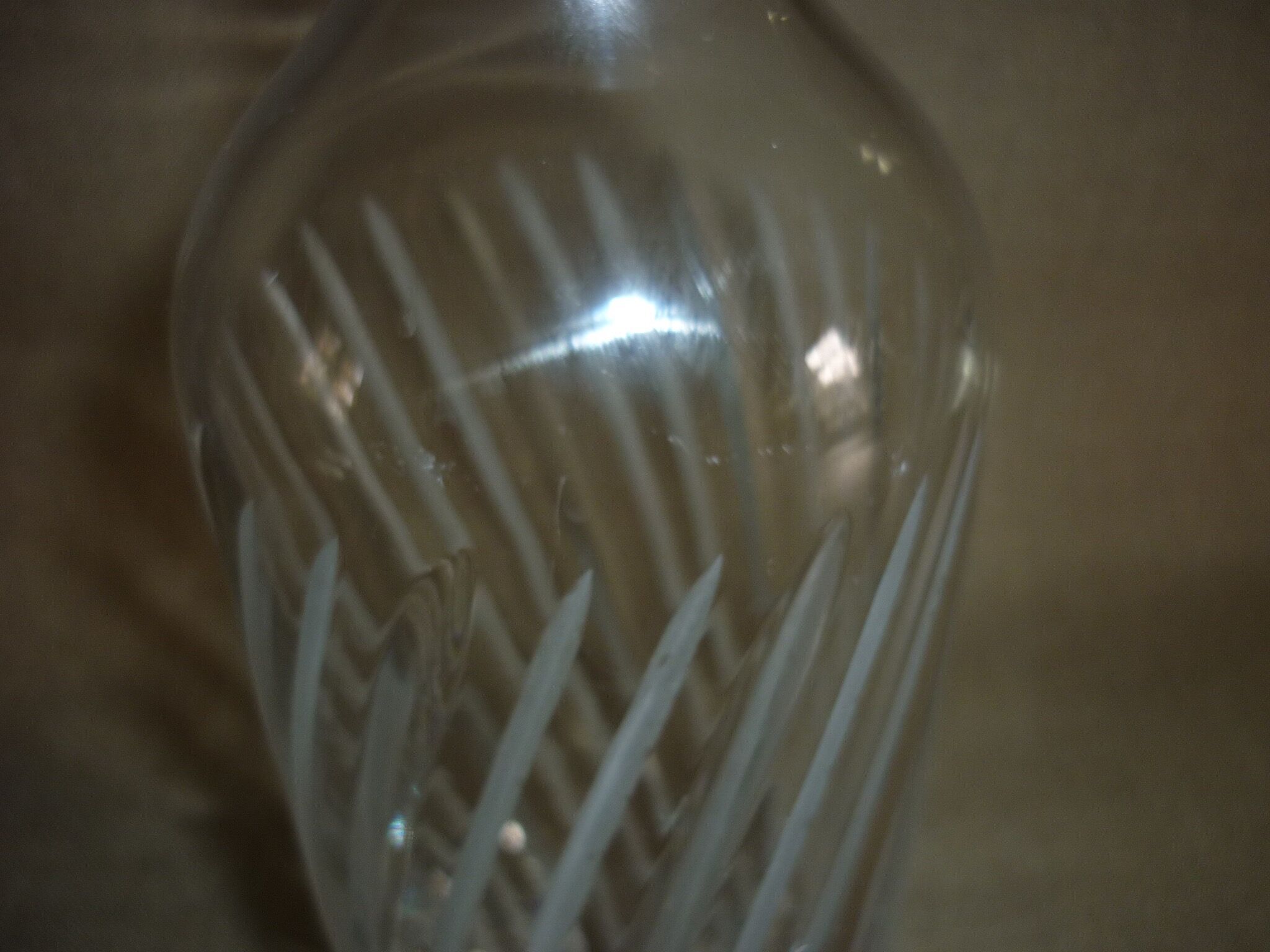 Chiseled glass bottle