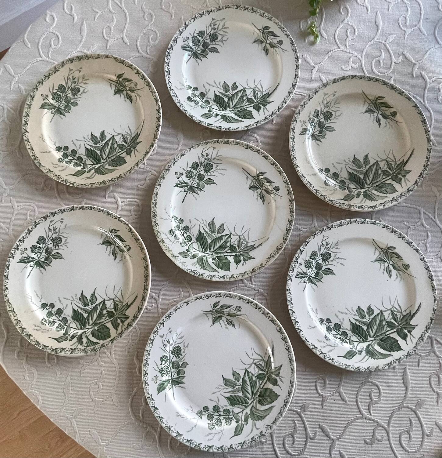 7 flat plates made of ironstone.