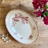 Old oval dish in iron earth