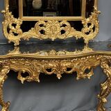 Mirror set with baroque style gilded wood console on marble top.
