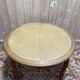 Round oak dining table with leather in Louis XV style.
