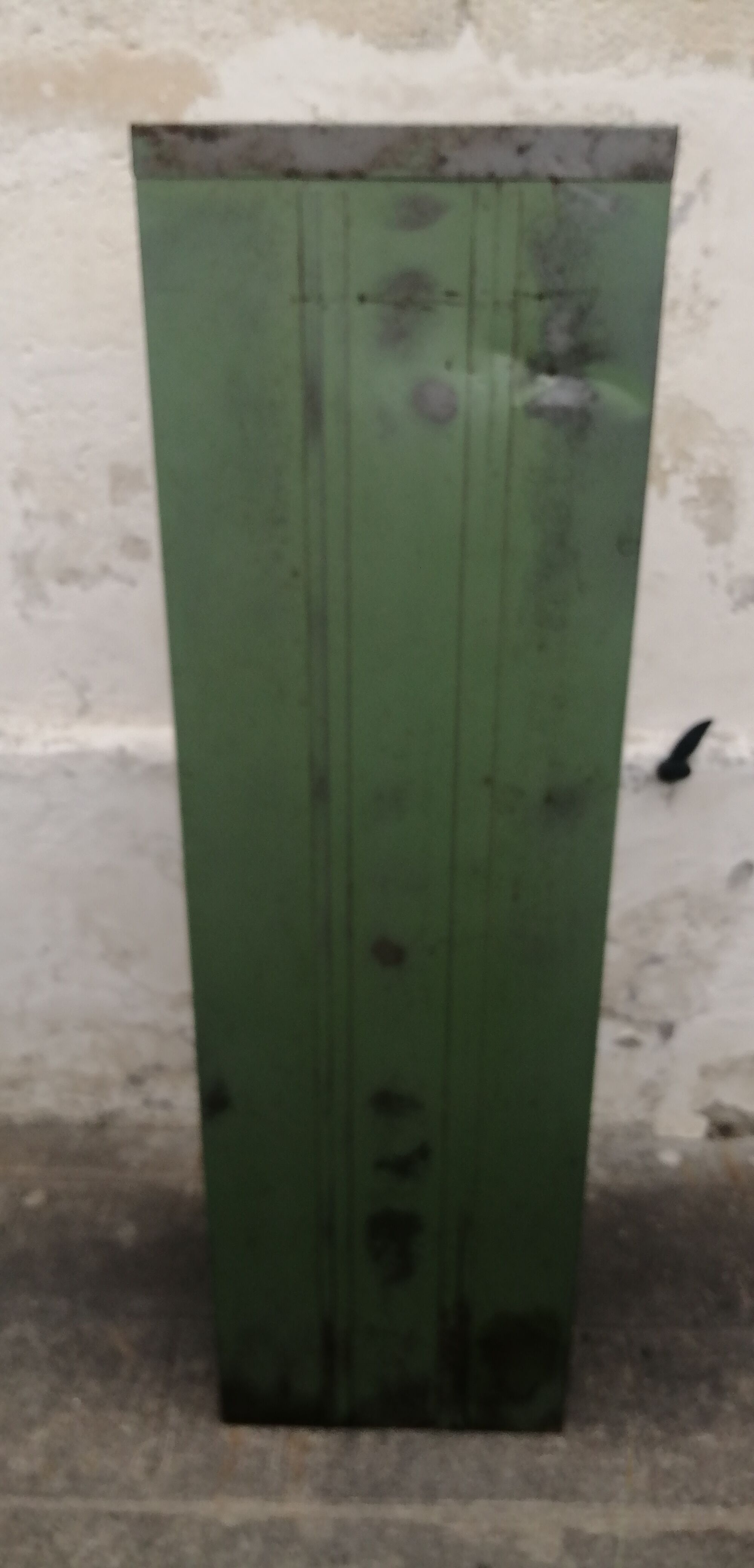 Antique metal cabinet with valves
