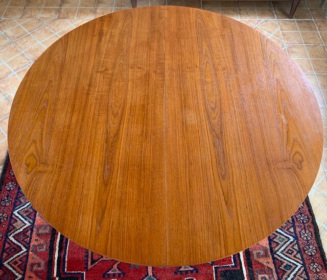 Expandable teak dining table, butterfly extension, circa 60s