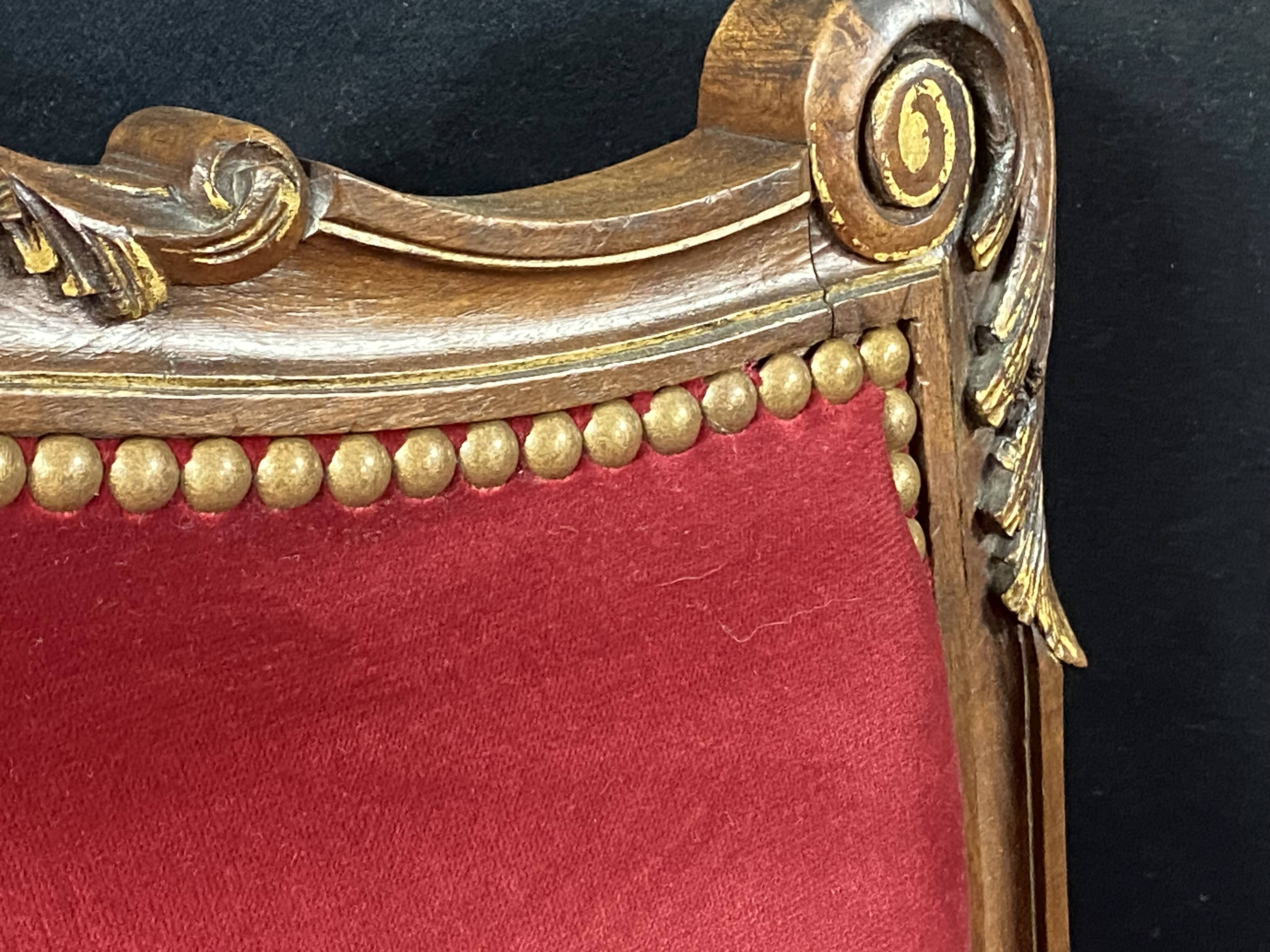 Pair of flat-back armchairs in Louis XV style in red velvet.