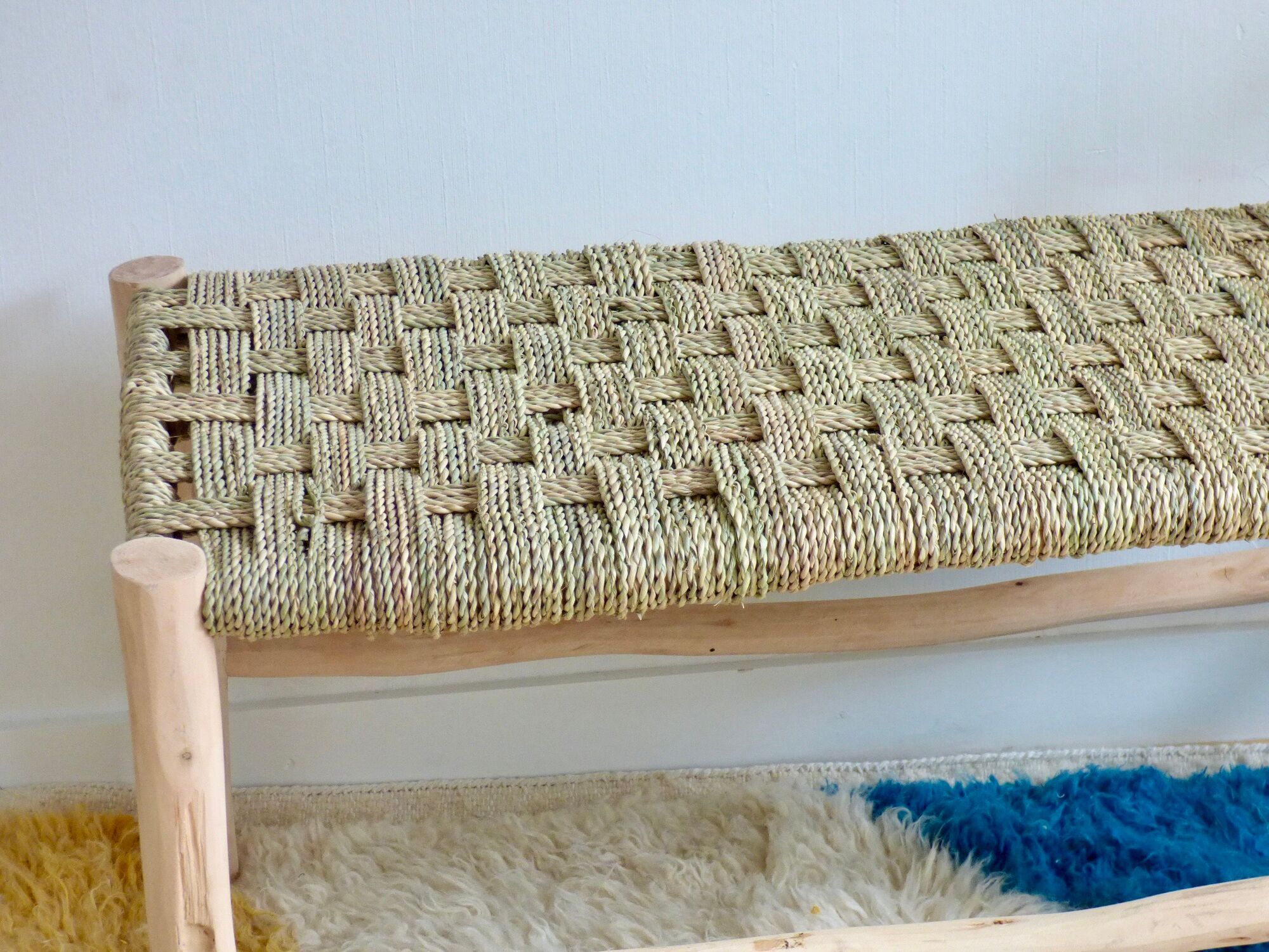 Lemon tree wood bench and braided palm leaf
