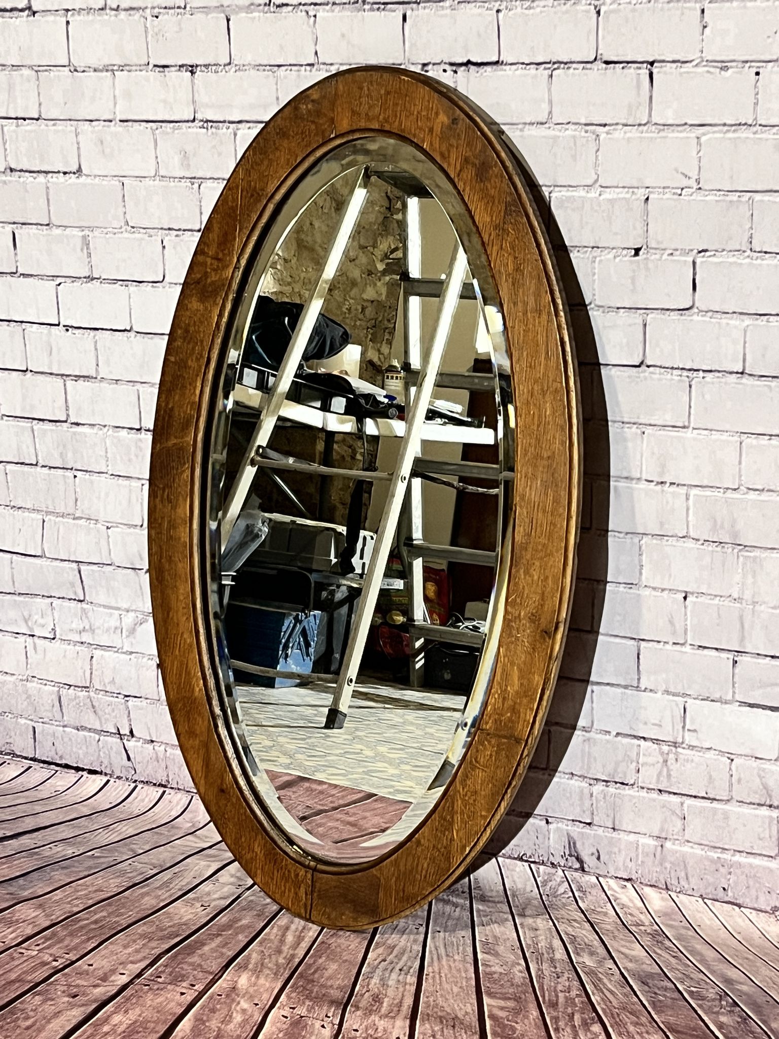 Oval beveled wooden mirror, 93x54 cm