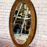 Oval beveled wooden mirror, 93x54 cm
