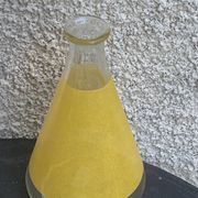Liqueur set consisting of a glass carafe and 8 small yellow glasses