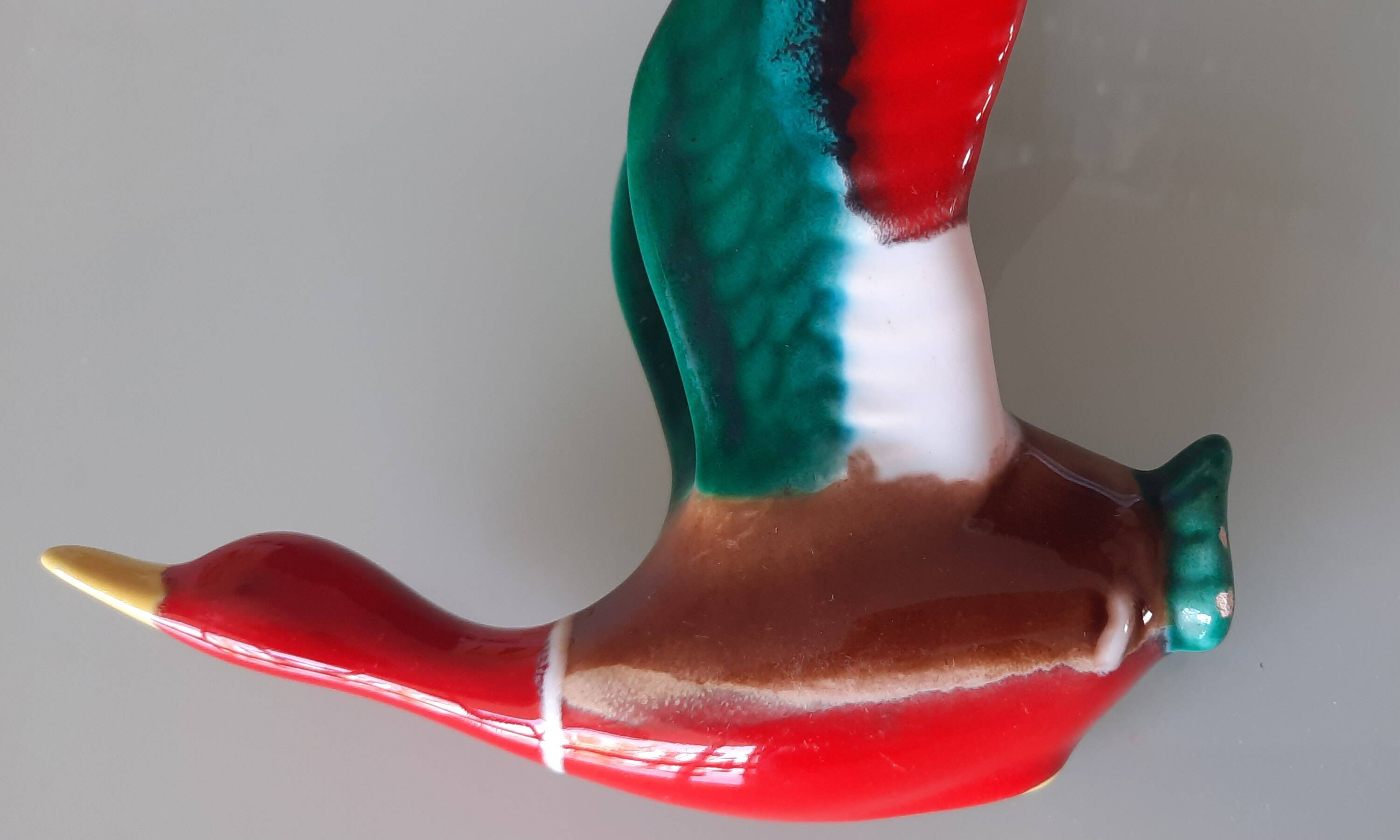 Pair of glazed ceramic wall ducks