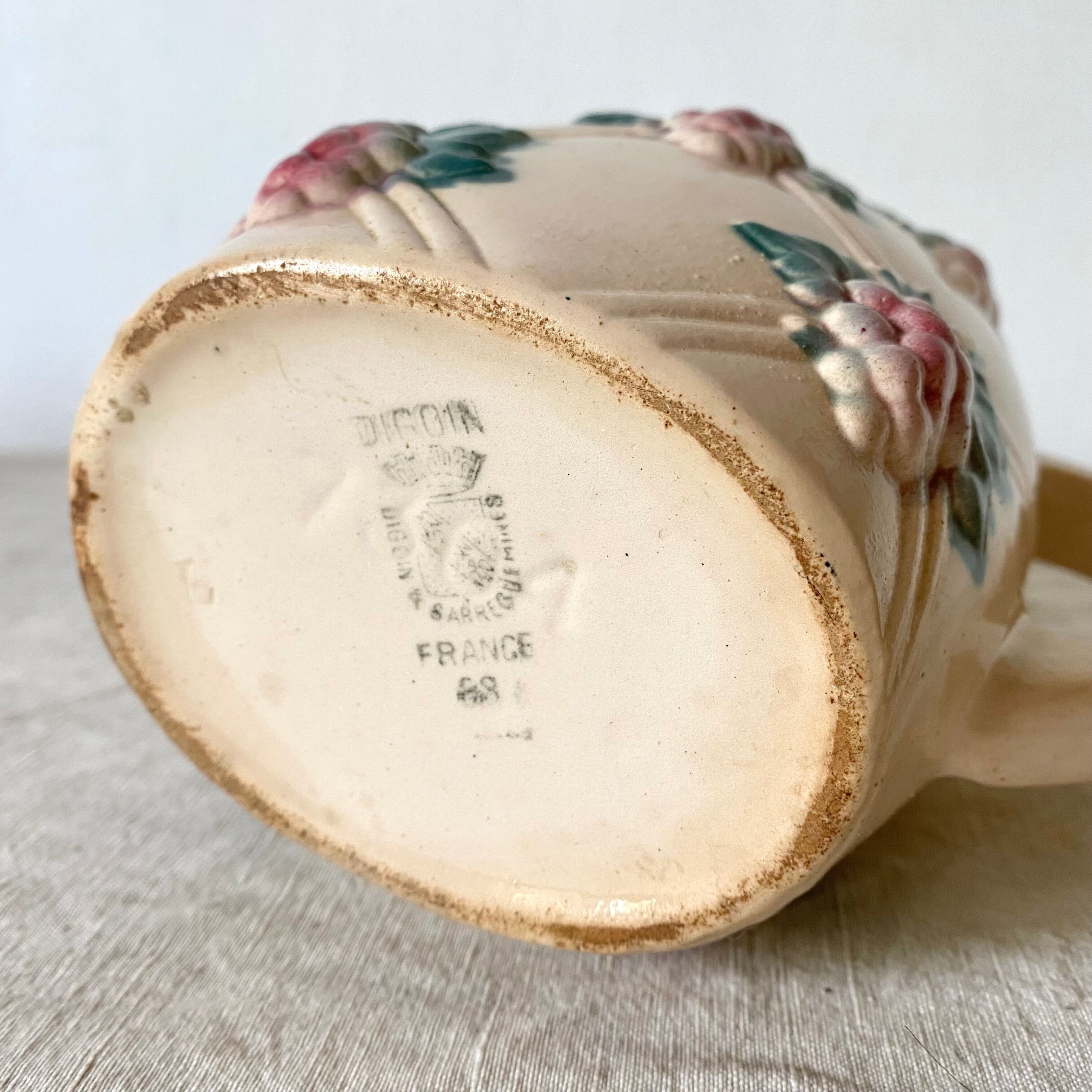 Antique pitcher in Digoin slip