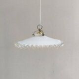 Notched opaline suspension