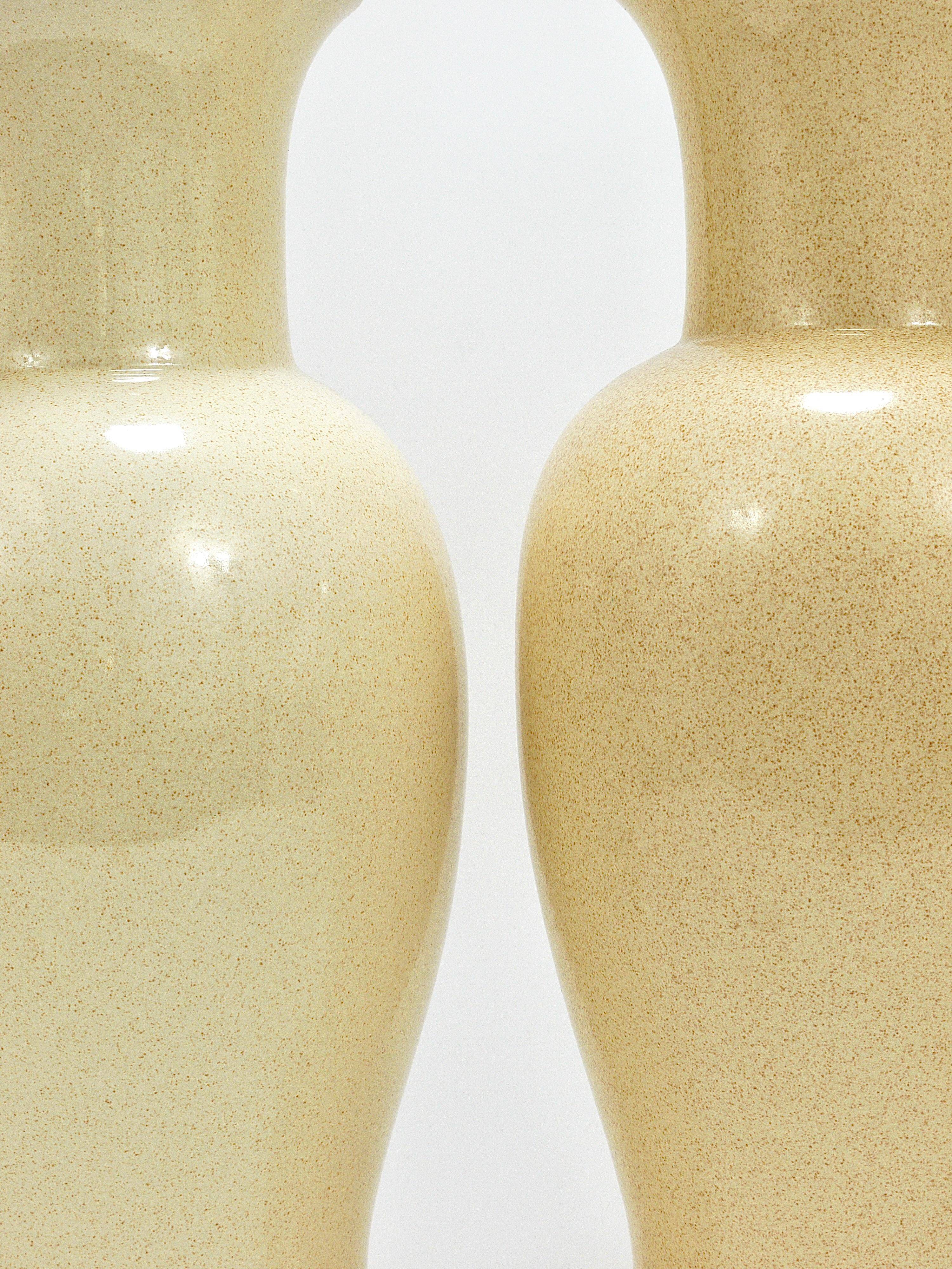 Pair of Tommaso Barbi Riviera palm tree table lamps from the 1970s with matching cushions.